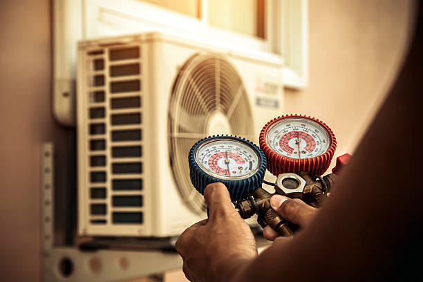 Professional Air Conditioning Service technician working in Viola, NY